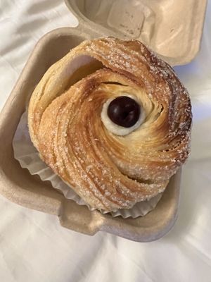 Cream filled croissant kind of heavenn  at Back Porch Baking Co - Pop Up in Asheville