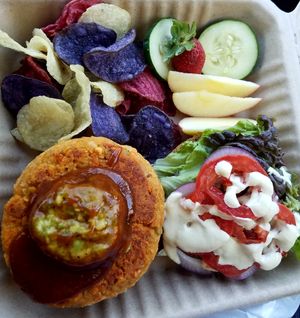 Lentil burger with bbq, guac, chips and fruit.  at Simple Bliss Cafe in South Lake Tahoe