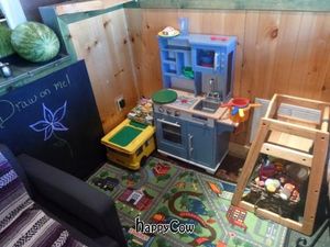 kiddo area with chalkboard, legos, kitchen and stuffed animals. The kitchen doubles as our employee training center. at Simple Bliss Cafe in South Lake Tahoe