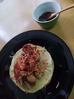 taco with fake-meat, dried tomatoes & carrots & onions at Punto V in Mexico City