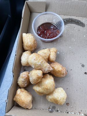 I forgot what these were called but they were like funnel cake balls. So addicting!  at Mora Pizza Denver in Denver