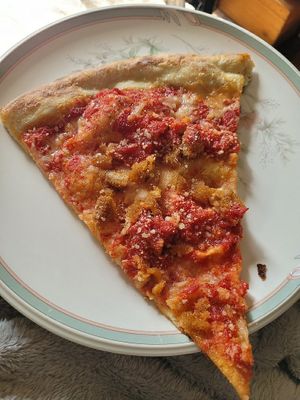 Chicken parm slice at Mora Pizza Denver in Denver