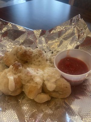 Cheesy garlic knots  at Mora Pizza Denver in Denver