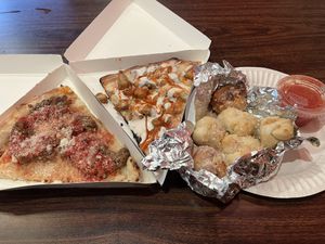 Delicious greasy sausage and buffalo chicken pizza with garlic knots.  at Mora Pizza Denver in Denver