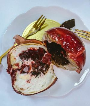 Cherry chocolate cake: fresh black cherry, cherry tea cream and chocolate biscuit at Cream Dream in London