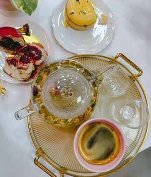 Cherry chocolate cake, tangerine tart, Carpathian tea and coffee at Cream Dream in London