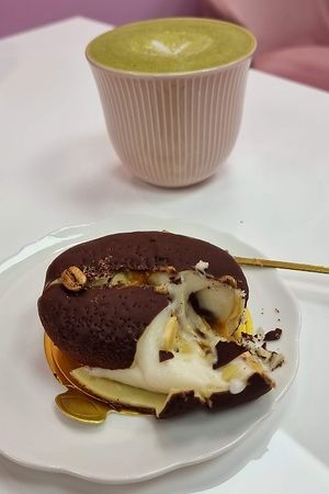 Coffee caramel cake and matcha latte at Cream Dream in London