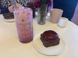 Dragonfruit matcha iced latte with a cherry tart   at Cream Dream in London