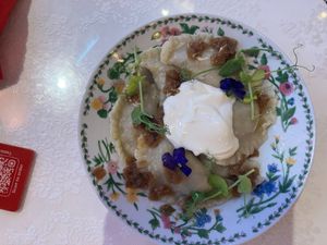 Varenyky With Cabbage:

Savory dumplings with stewed cabbage, accompanied by fresh salad greens and a side of vegan sour cream. at Cream Dream - Covent Garden in London