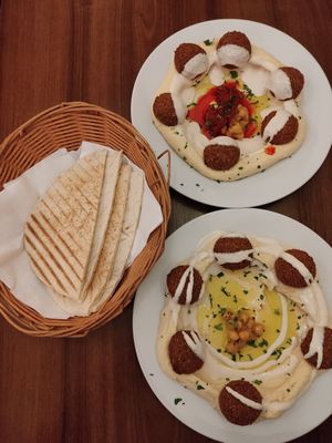 Hummus, falafel and bread - one spicy, one not. Both #3 on the menu. at Palestinian Restaurant - Spalena in Prague