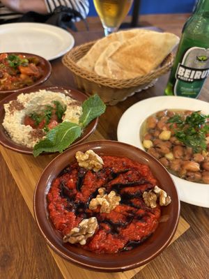 Trío de entrantes (starters) and foul mudammas (beans with lemon super tasty)  at Lazeez BBQ in Barcelona