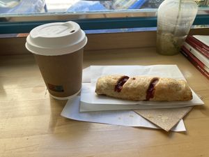 Vegan sausage and cappuccino Freddo at Bamboo Vegan Cafe in Athens