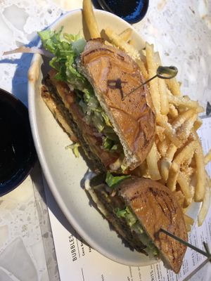 Planta burger -no lettuce, no tomato, no mustard, no queso, no pickle , no mayo, just onion (served with fries, not salad) 
  at PLANTA in Brooklyn