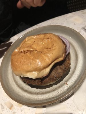 Planta burger -no lettuce, no tomato, no mustard, no queso, no pickle , no mayo, just onion (served with fries, not salad) 
  at PLANTA in Brooklyn