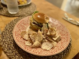 Vegan burger with root veggie chips  at Trova Coastal Kitchen in Humacao