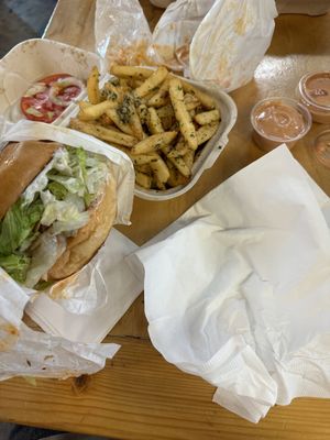 Buffalo chicken burger, garlic fries and tastyyyy sauce   at Mission Burger Co in Austin