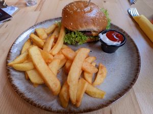 Vegan cheeseburger with fries and vegan mayo at Humboldt in Cologne