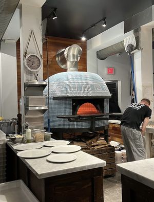 Great atmosphere - the pizza oven is right in the middle of the restaurant !  at Via Tevere Pizzeria Napoletana in Vancouver