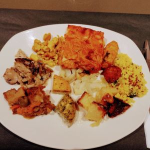 Lasagna plus other delightful morsels. at Ops Cucina Mediterranea in Rome