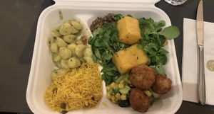 Potato gnocchi, rice, lentils, a cucumber corn salad, and some other things I don’t remember under the greens.  at Ops Cucina Mediterranea in Rome