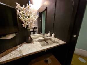 Sink at toilets at Ops Cucina Mediterranea in Rome