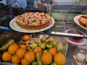 Pie and fruit in counter at Ops Cucina Mediterranea in Rome