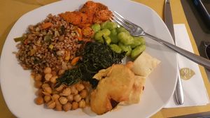 Farro, chickpeas, gnocchi, spinach, carrots, tempura veggies at Ops Cucina Mediterranea in Rome