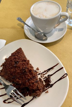 Chocolate cake and cappuccino  at Ops Cucina Mediterranea in Rome