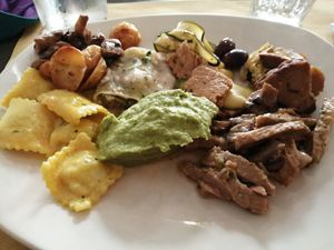 Ravioli, cannelloni, straccetti di soia e seitan con pesto di avocado at Ops Cucina Mediterranea in Rome