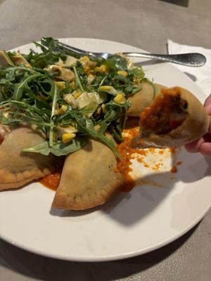 Beyond sausage empanadas  at Zest in Bay Shore