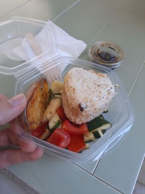 Baked potato, onigiri and salad at Verde Vida - Rua Formosa in Porto