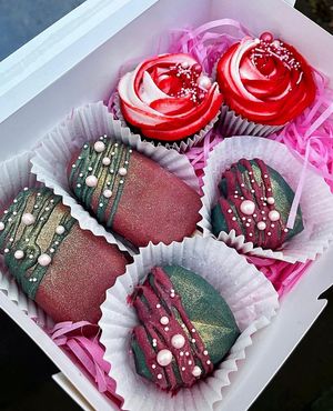 Treat box with red velvet cupcakes, brownie cakesicles and vanilla heart cake pops  at The Avant Garden Bakery in Newcastle Upon Tyne