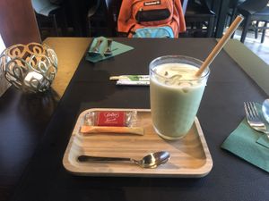 Iced matcha latte. You can choose between oat or soy milk.  at TAKE in Mechelen