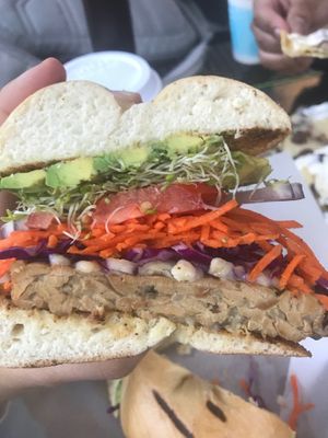 Vegan Tempeh burger on bagels ( burger buns not vegan) at Sprouts Natural Foods Cafe in South Lake Tahoe