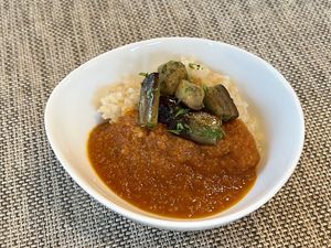 Brown rice with curry and eggplant.   at Pas a Pas in Miyota
