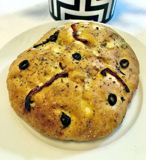 Olive and tomato focaccia  at VEGO Cafe & Confectionery in Dubai