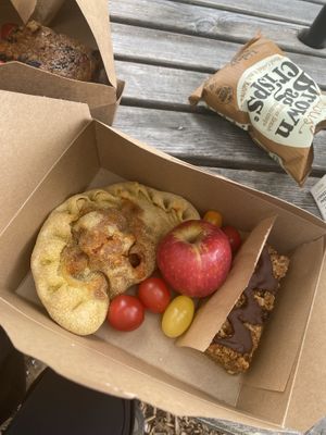 Picnic packed lunch: this one was a BBQ ‘chicken’ and sweet potato calzone + the thickest (and most delicious) flapjack on Earth + fruit + crisps  at Greenstone Lodge  in Bridge Of Orchy