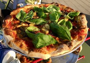Artichoke and olive pizza  at Marmellata Bakery in Abu Dhabi