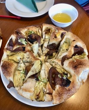 Onion and artichoke focaccia   at Marmellata Bakery in Abu Dhabi