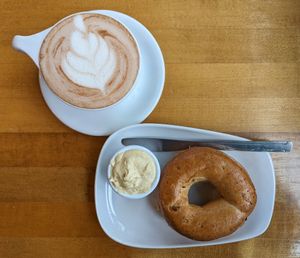 hot chocolate with oat milk and a whole wheat bagel with hummus at Black Ink Coffee in Oregon City