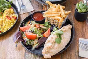 Cornish pasty served with salad and chips at Aromalily Café in Ferntree Gully