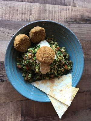 Falafel balls served on mediterannean tabouli salad at Aromalily Café in Ferntree Gully