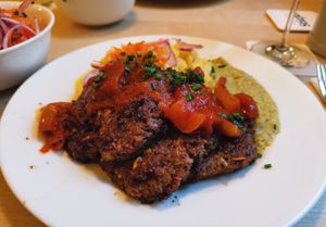 Veggie patties with potato salad and zucchini dip at Brauhaus zum Stiefel in Saarbrucken