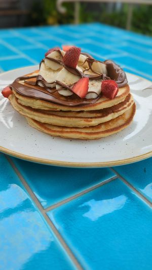 Banana and Strawberry Pancakes at One Table Cafe in Little Mountain