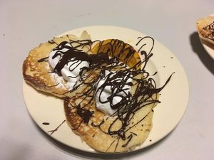 Pancakes with whipped cream and chocolate at De Otter in Leiden