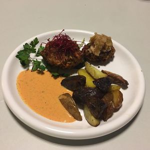 Veggie burger with roasted potatoes and sweet paprika sauce  at De Otter in Leiden