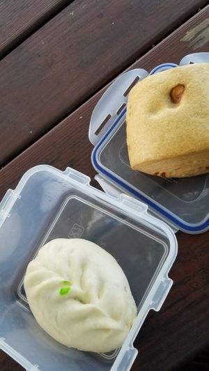 Vegetable bun (left), Okinawa brown sugar bun (right) at Changji Old Street Donghe Steamed Buns - Taitung Buns - 纏記舊街東河包子 in Donghe