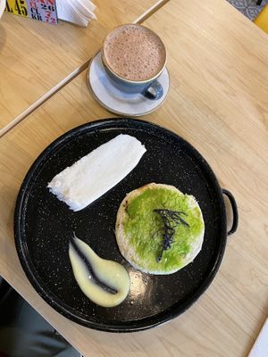 Arepa filled with cheese and cheese w hot chocolate   at ChapiYork in Bogota