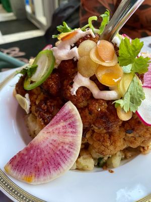 Surprisingly delicious roasted cauliflower! So flavourful and the bed of rice was perfect   at Bar Sofia in Halifax