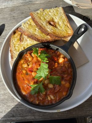 Home made beans with sourdough   at Convoy Commune in Merewether
